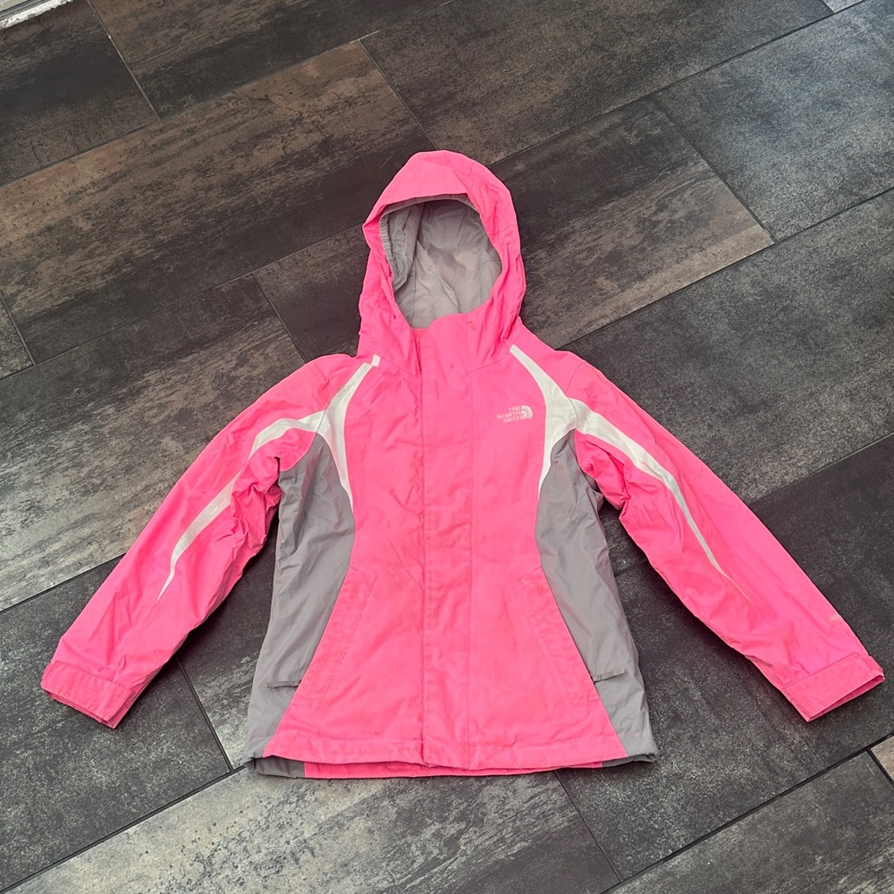 The North Face Pink and Gray Girls Ski Jacket with Zip in Fleece liner.